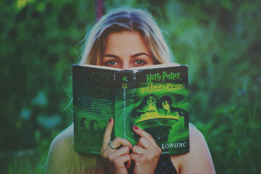 woman reading harry potter book